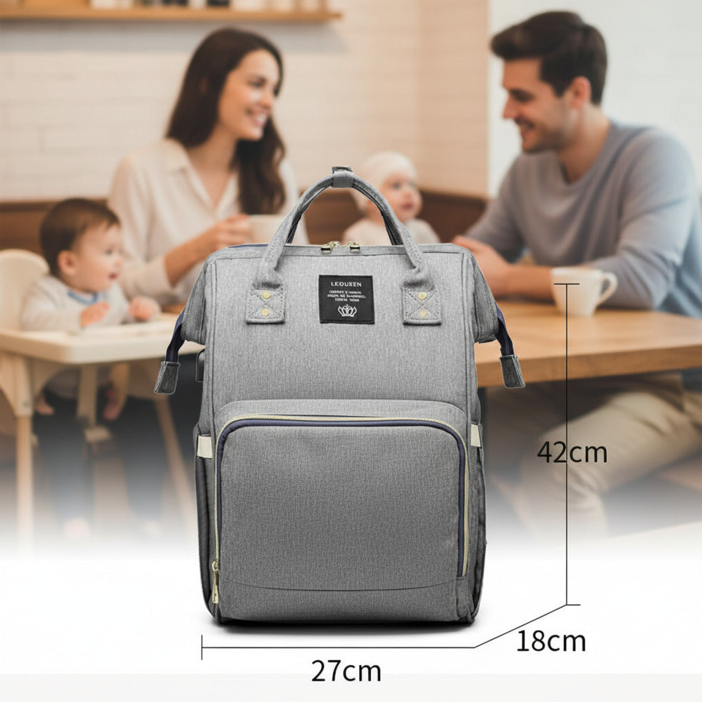 A gray fabric diaper bag or backpack-style carrier shown front-facing on a white background, with printed dimensions (42cm, 18cm, 27cm)